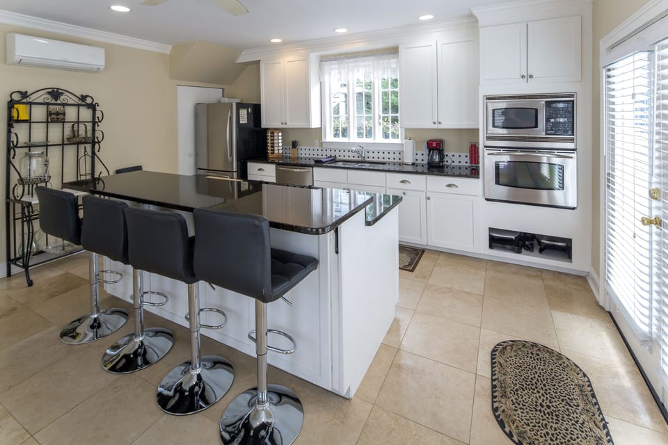 People cooking & those sitting at counter can easily converse in this space. 