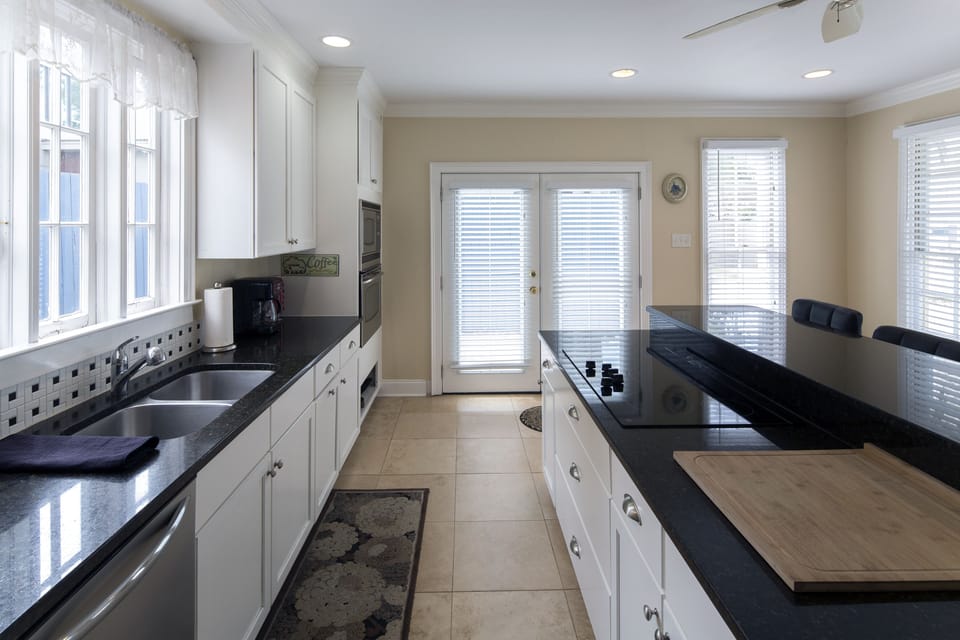 This kitchen is as well equipped as most homes. It is bright and open. 