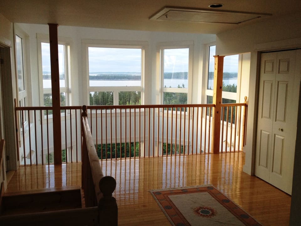 2nd floor hall overlooking ocean from 2-story atrium.