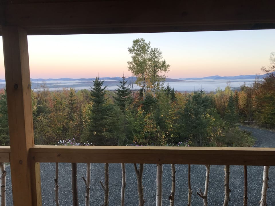 Sunrise View with fog over  Cherry Pond