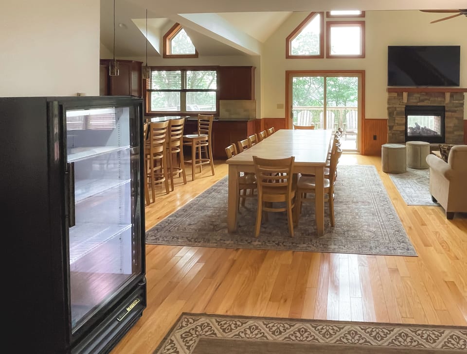 Open Concept dining to living area with large beer and wine fridge