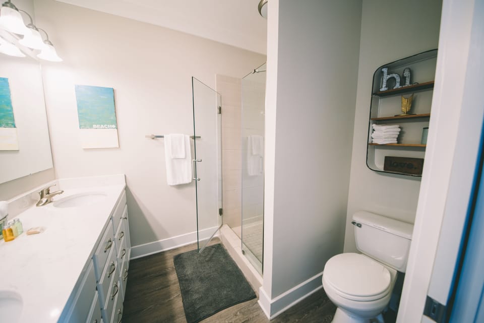 Private en suite bath has ample storage!