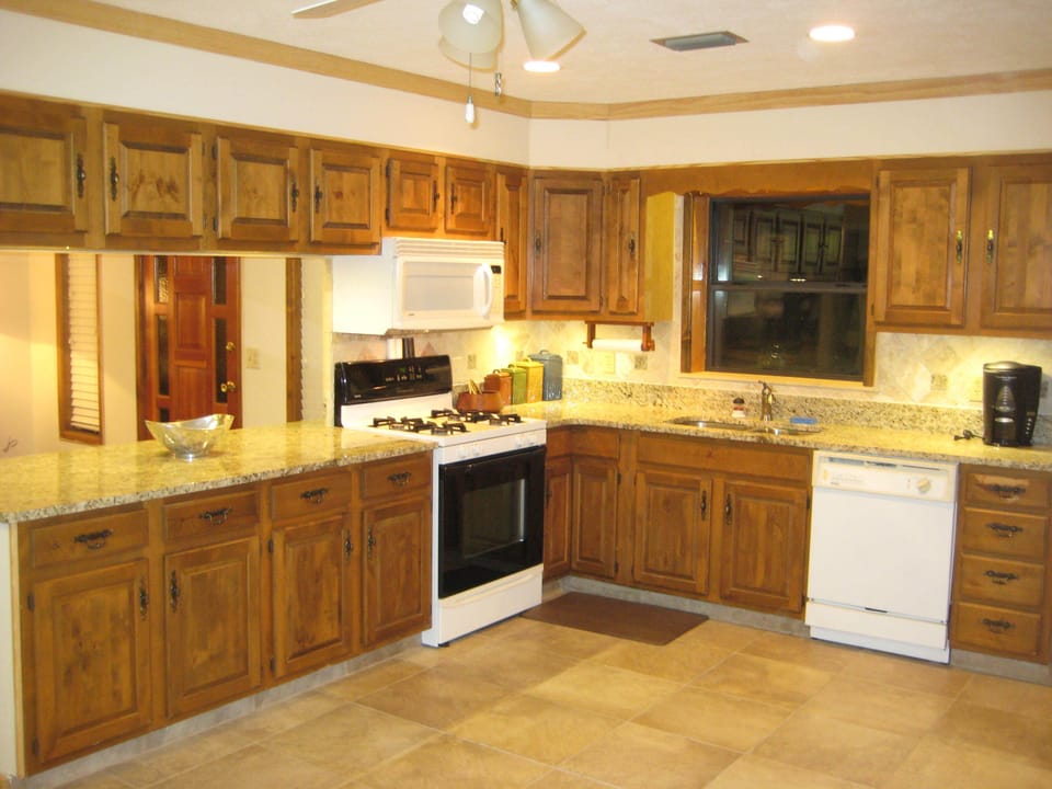 Remodeled Kitchen with granite countertops, laundry, microwave, & gas range!