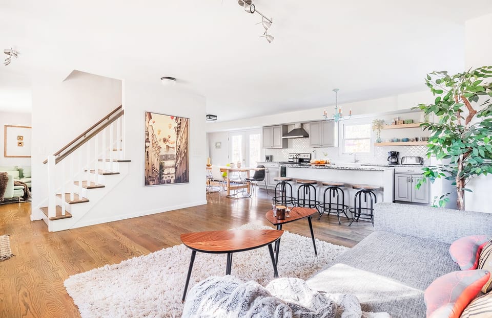 Living room with view of kitchen and dining table