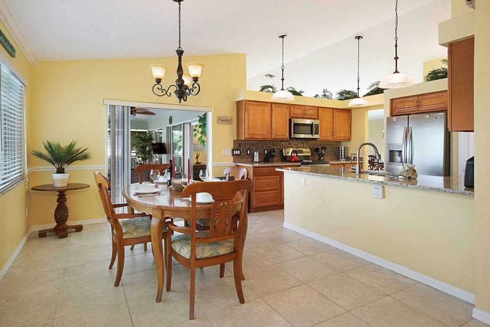 There is a breakfast nook off the kitchen with room for 4