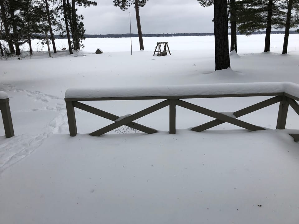 View from the deck in winter.  Lake is completely frozen over.