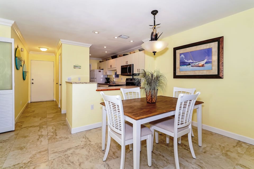 Dining room is right off the kitchen with seating for four