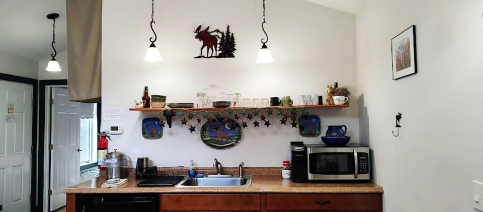 Kitchenette with Keurig and tea kettle