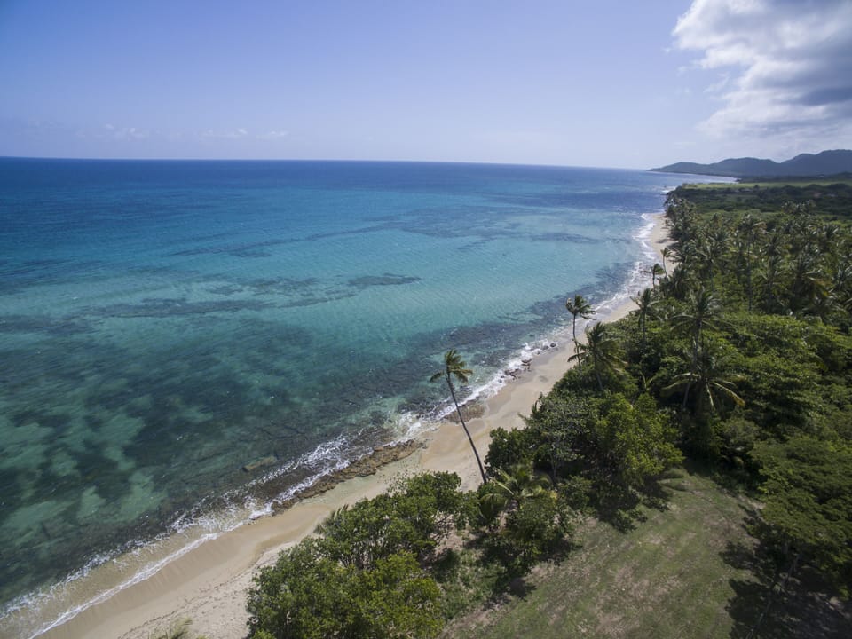 View from Encantada down Coco Beach looking west. Direct access to this beach!