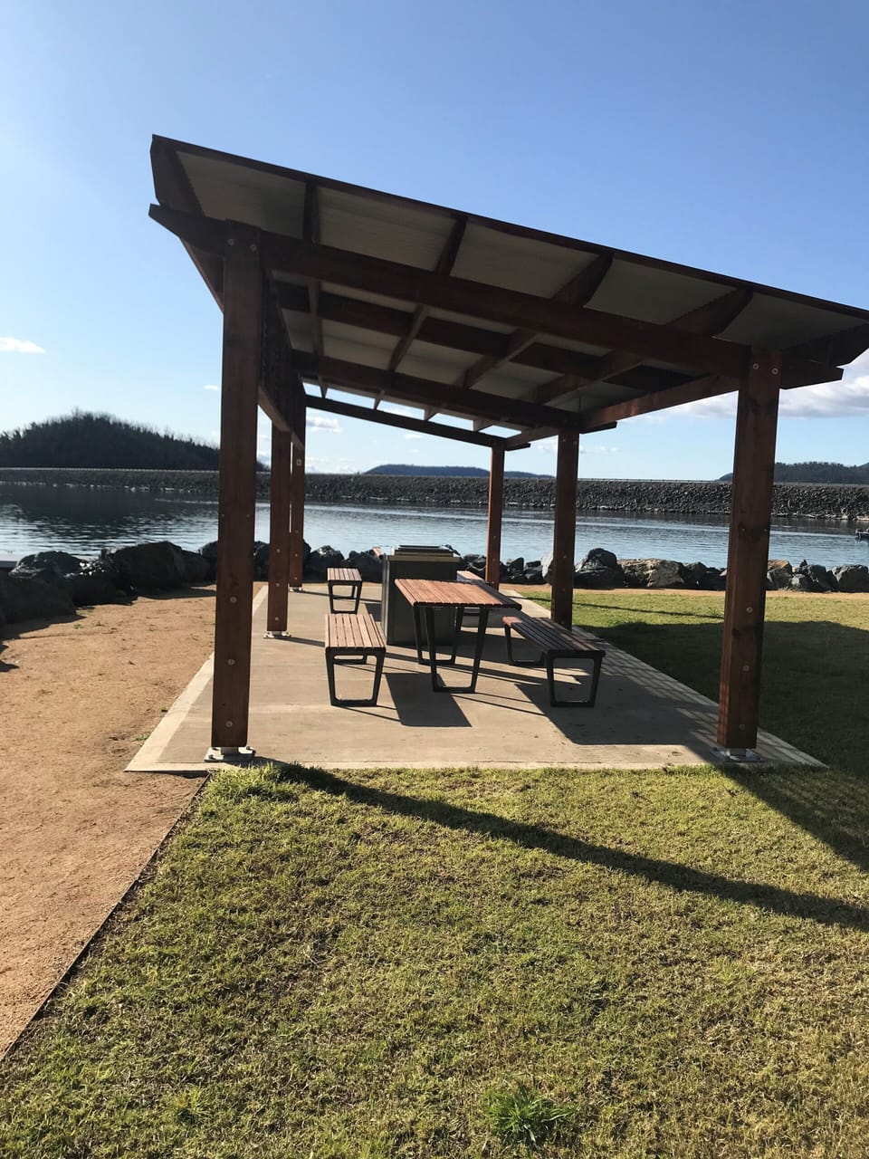 BBq and shelter in swimming area.