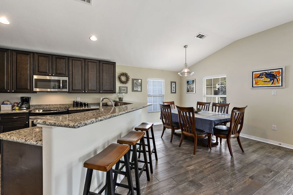 Beautiful Kitchen, dining with all dishes, pots, pans, utensils, etc.
