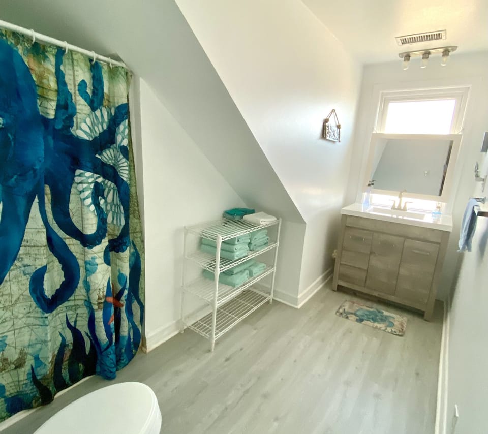 Modern upstairs spacious bathroom with shower 