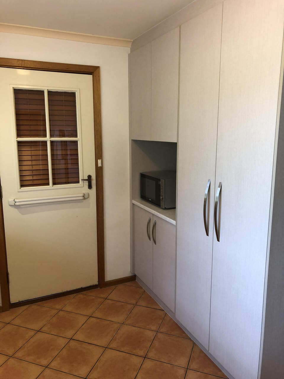 Cupboards and microwave alcove