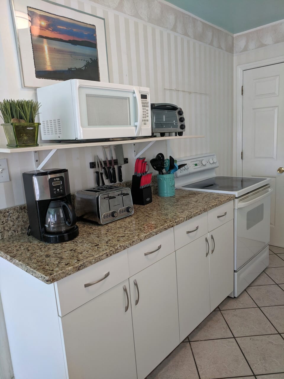 Stove, microwave pantry area