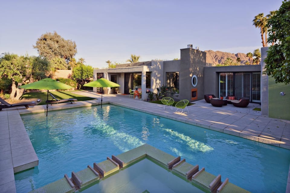 wonderful salt water pool, hot tub and private yard area with multiple seating