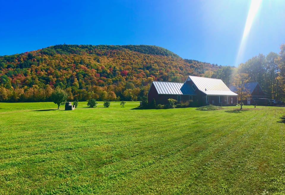 Back deck and hot tub view of main Farmhouse