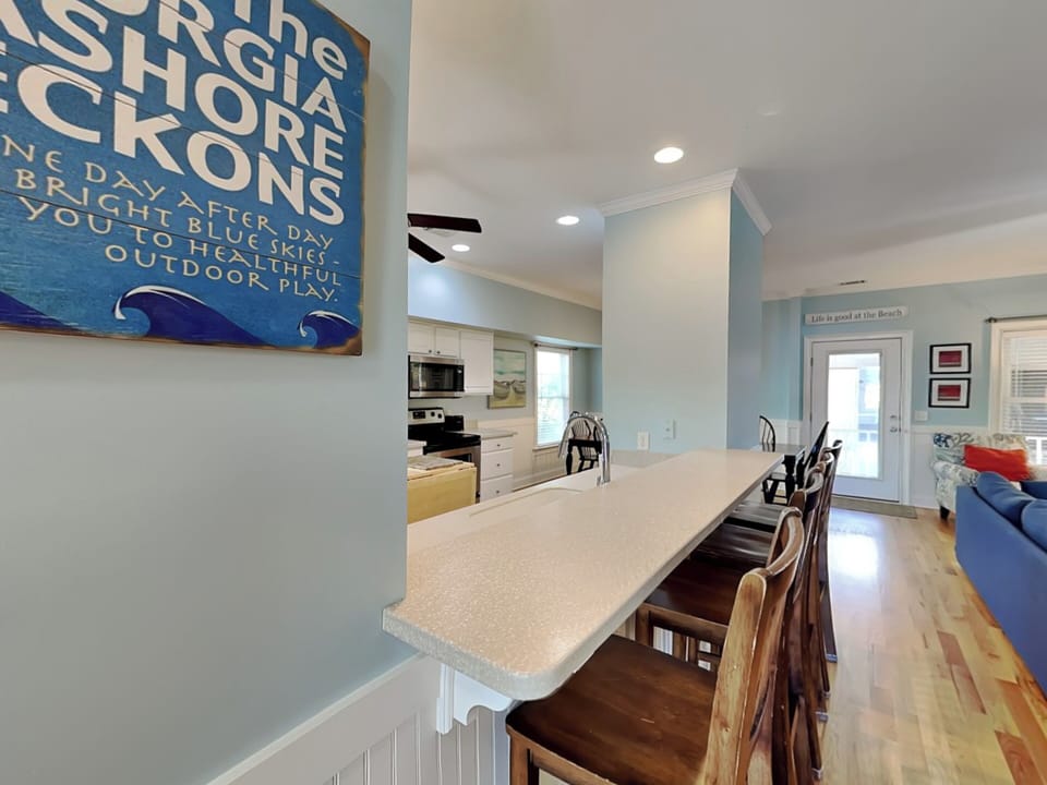 Convenient Pass-Through Breakfast Bar w/ Bar Counter Seating