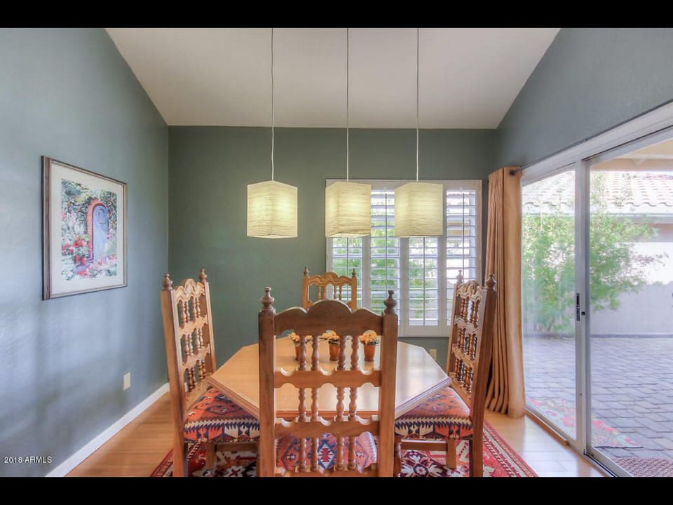 Dining area off kitchen with access to patio