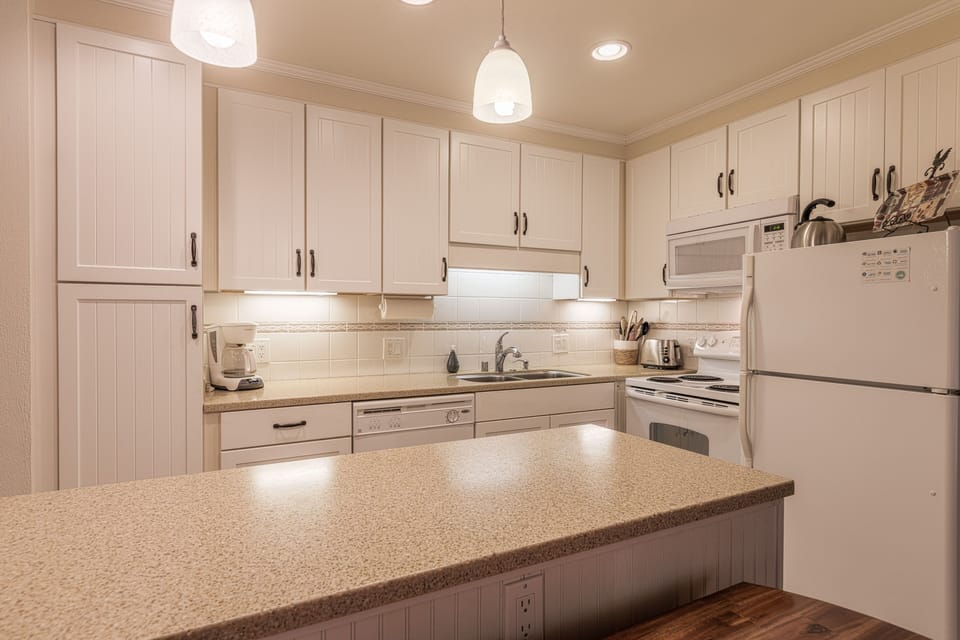 Coffee/tea maker, fridge, microwave, oven