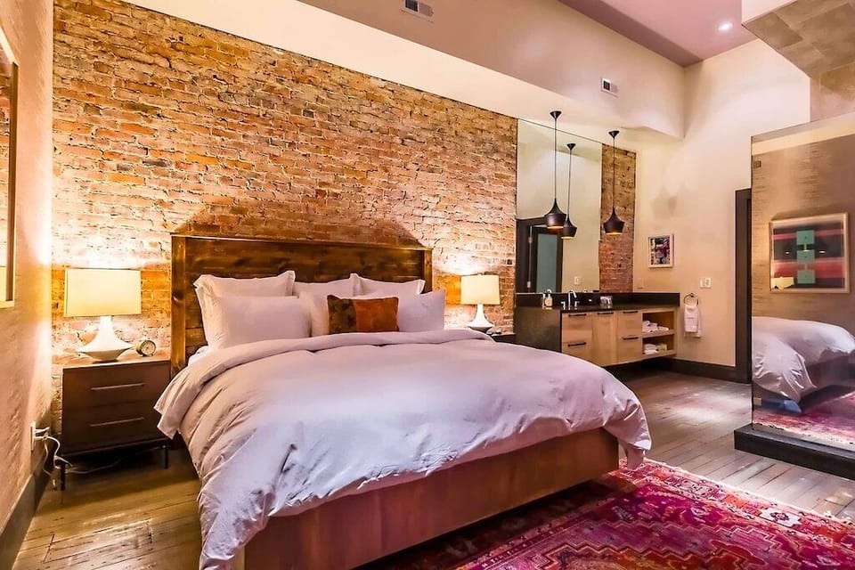 Bedroom 3 with King bed, all luxury down bedding, shower, closet and tv