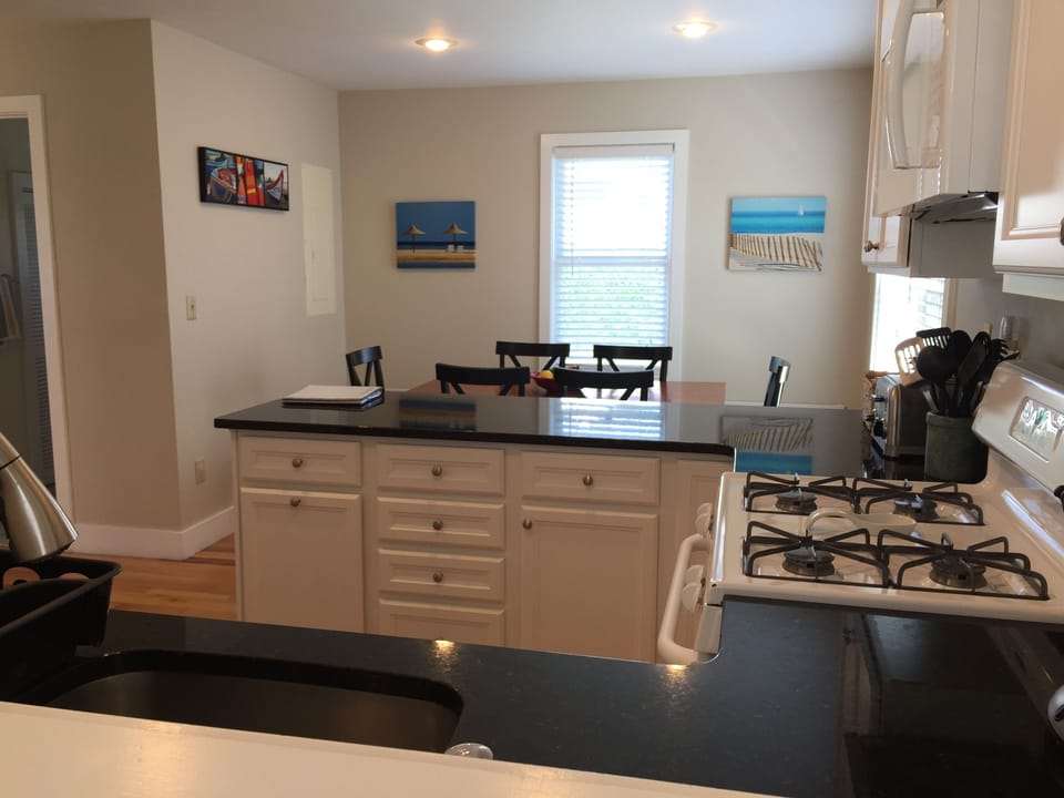 Opening to the living room so the chef can see the ocean too!