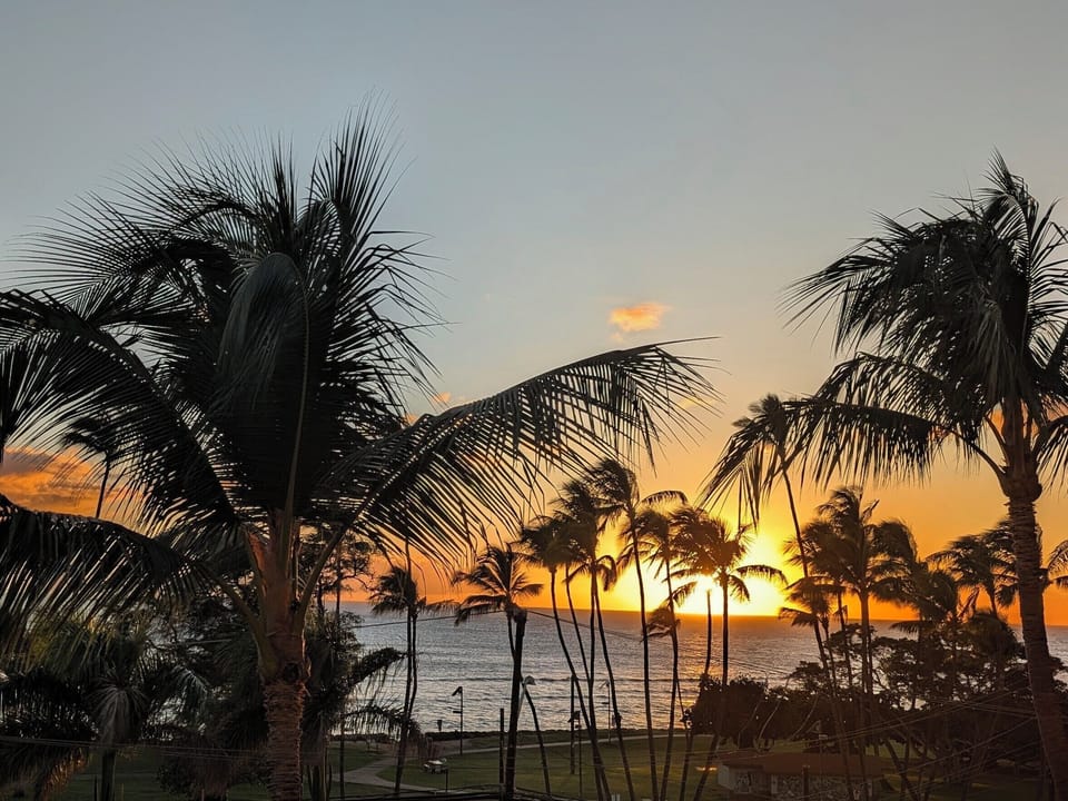 Sunset view from the living room and the lanai (balcony)