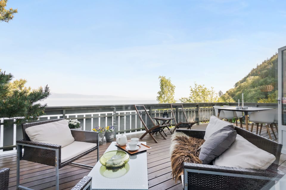 Outdoor area with sofa and place for eating