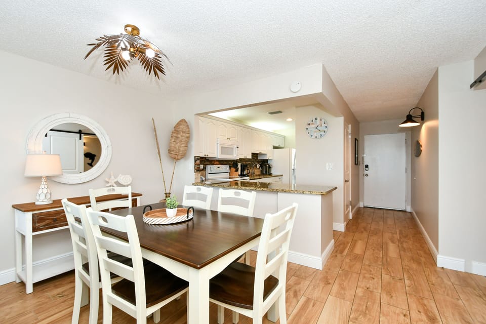 Dining room is right off the kitchen with seating for four