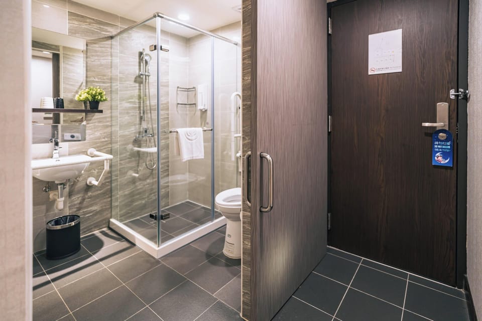 Economy Double Room, 1 Double Bed (No Window) | Bathroom | Shower, hair dryer, slippers, towels