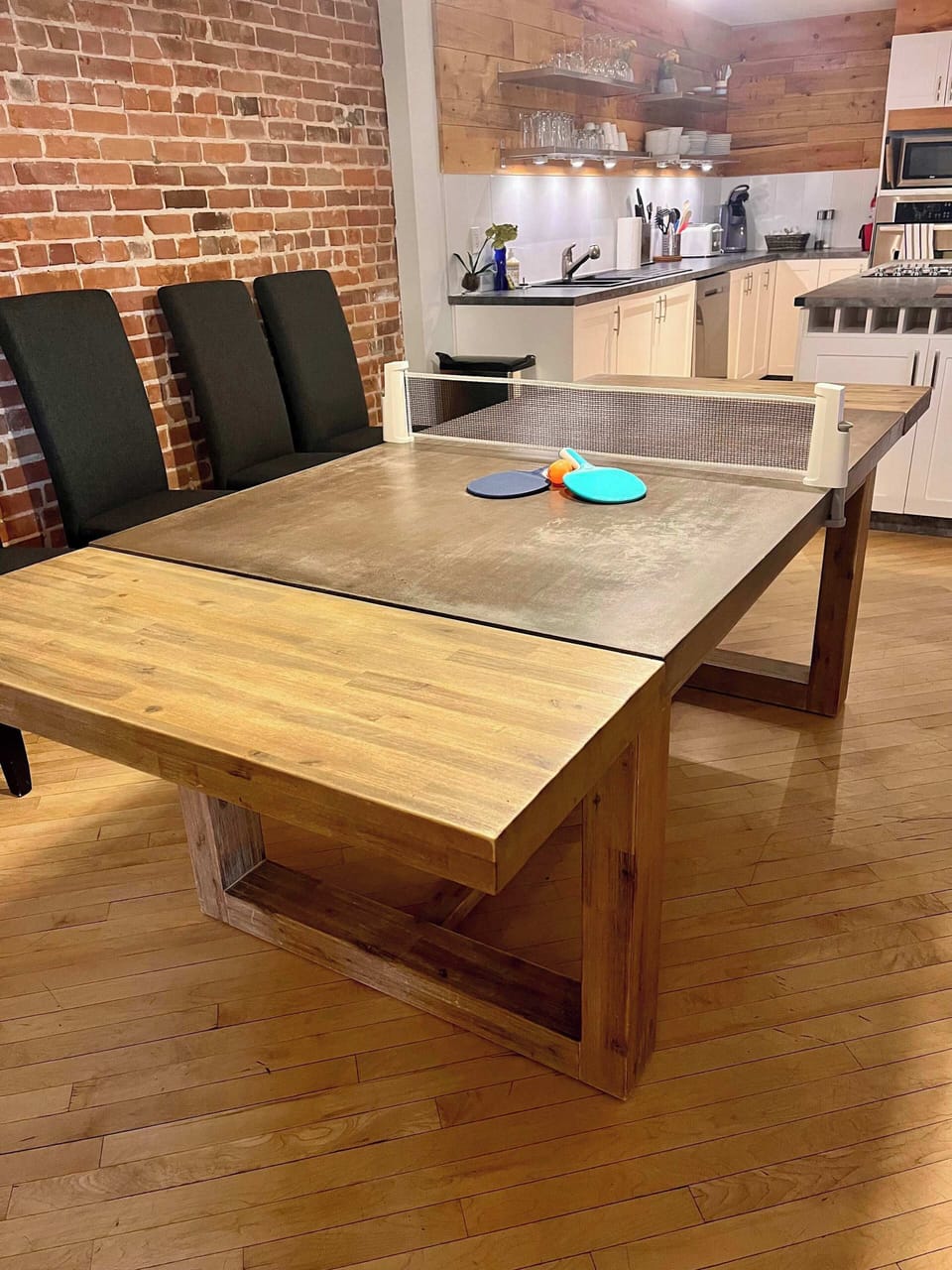 Play ping-pong on the dining table, there's plenty of space around.
