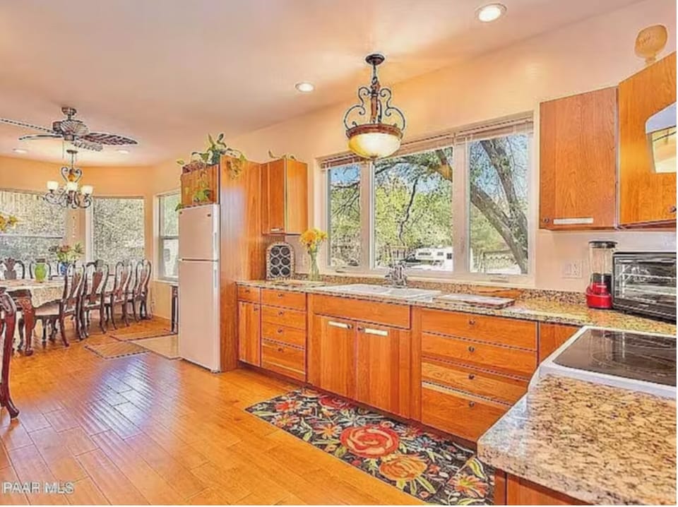 Granite countertops, maple cabinets, microwave..We use our hands to wash dishes.