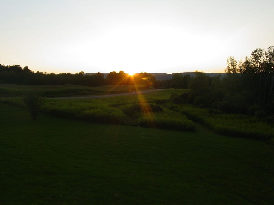 Watch Beautiful sunsets from the covered front porches!