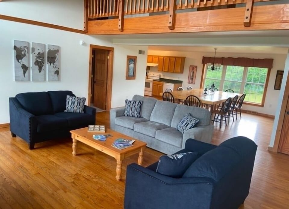 Living Room with Cathedral Ceiling and an open floor plan.