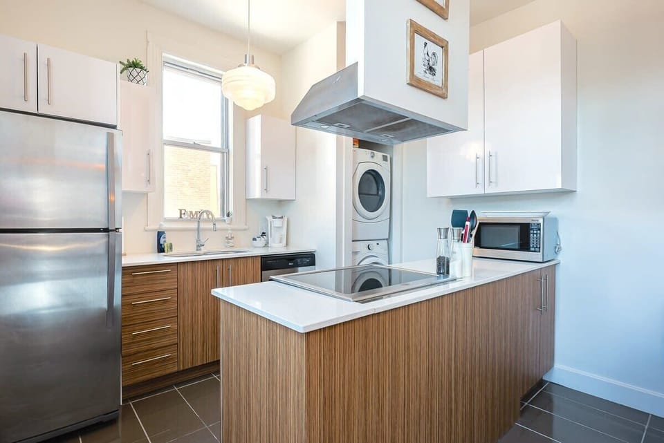 Washer and dryer in the kitchen with detergent