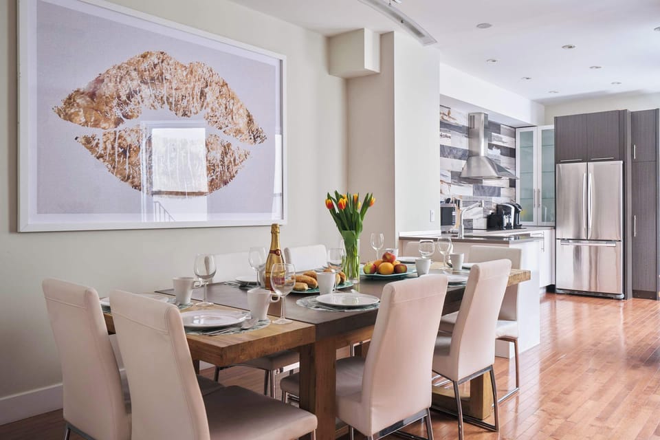 Inviting dining area next to the kitchen, view on the terrace