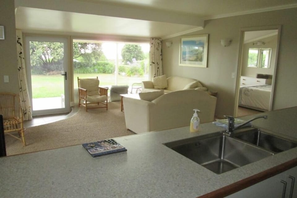 Open plan kitchen/sitting room with views to the ocean