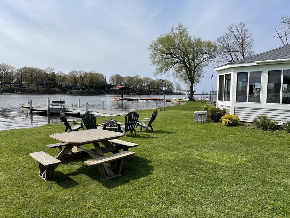 Enjoy the fire pit and s'mores! Along with a large table along the shoreline 