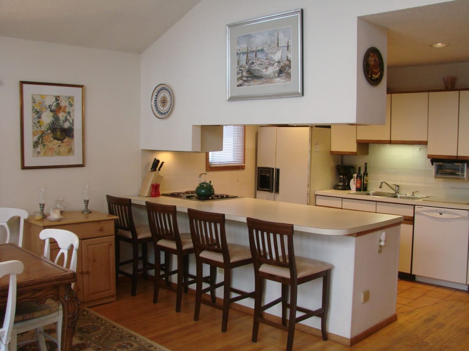 Looking into kitchen from open dining room-living room
