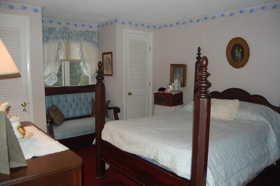 Four posted antique  bedroom set  in master bedroom