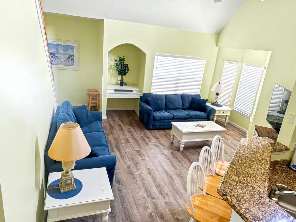 Spacious Living Room. 65" TV. Open to Kitchen and Dining.  Ample space to visit 