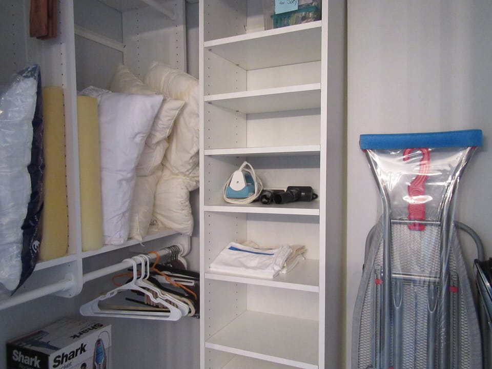Master closet is customized with ample shelves, Blankets, pillows, Iron, etc