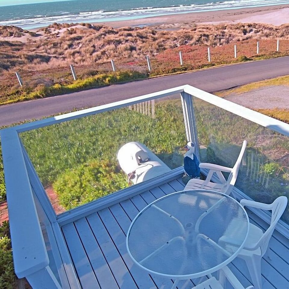 Relax With Your Cup Of Coffee Or Glass Of Wine.  Glass Protection From The Wind.