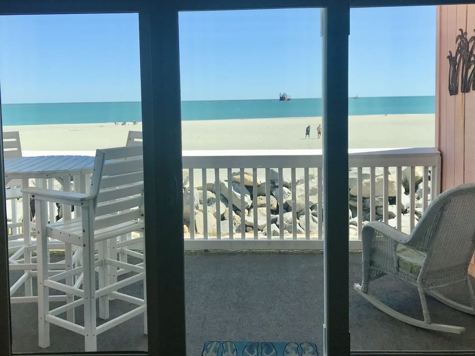 Oh such a beautiful view, from your living room and kitchen area and beach deck!