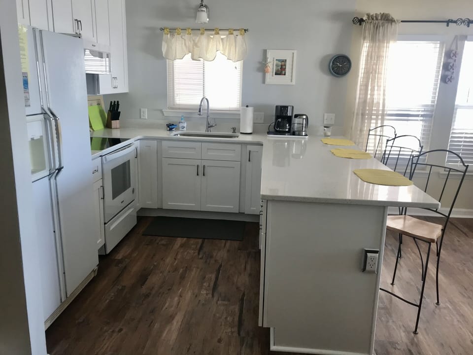 Very spacious brand new kitchen!  Counter height for easy serving and eating!