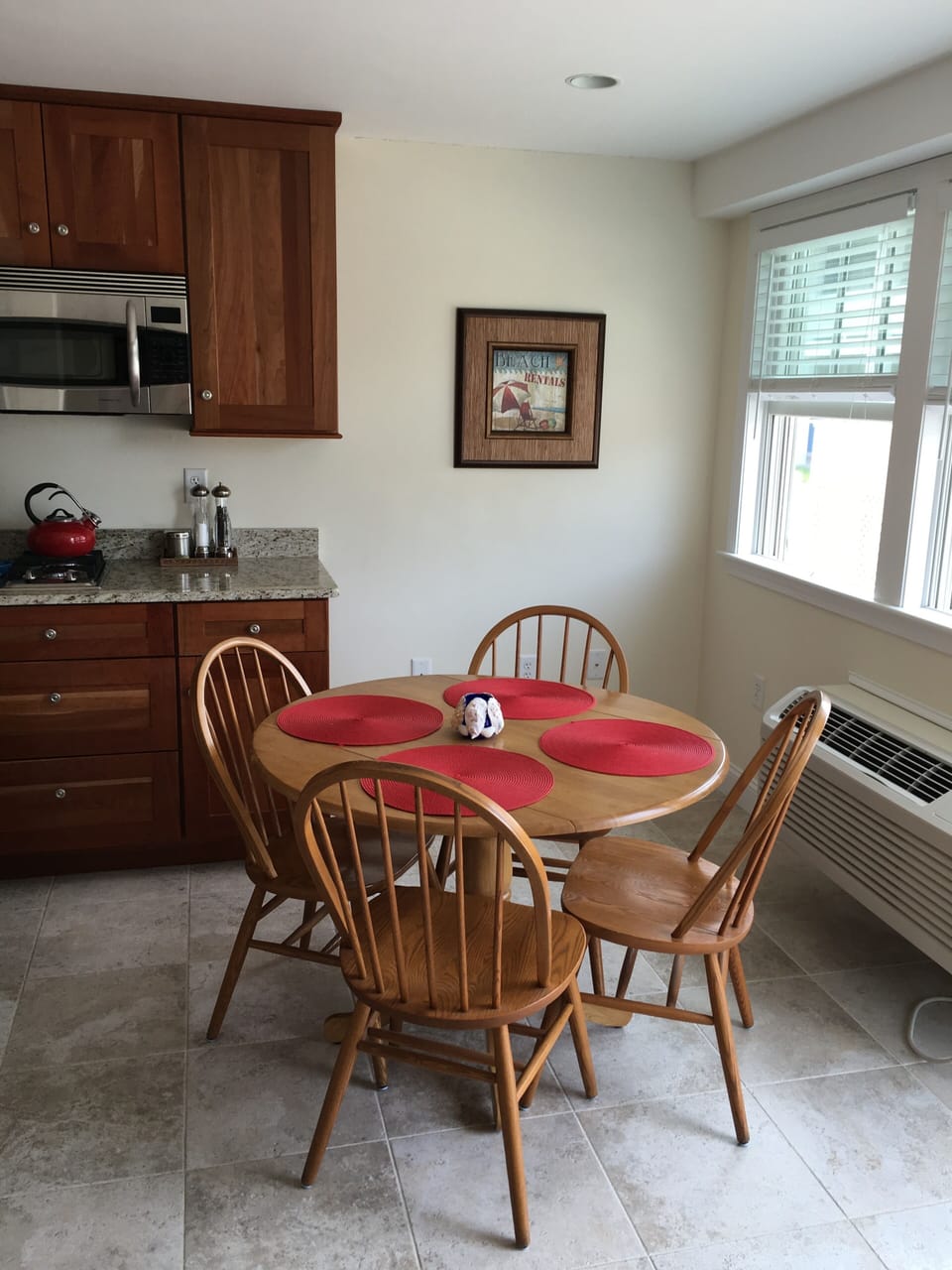 Dishwasher microwave, Keurig coffee maker, plenty of plates, utensils , cookware