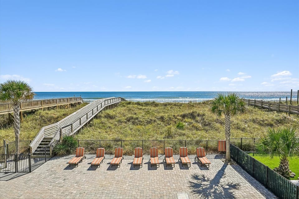 Take the private walkway down to the beach for the day.