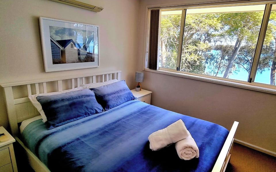 Primary with private retreat & lake views