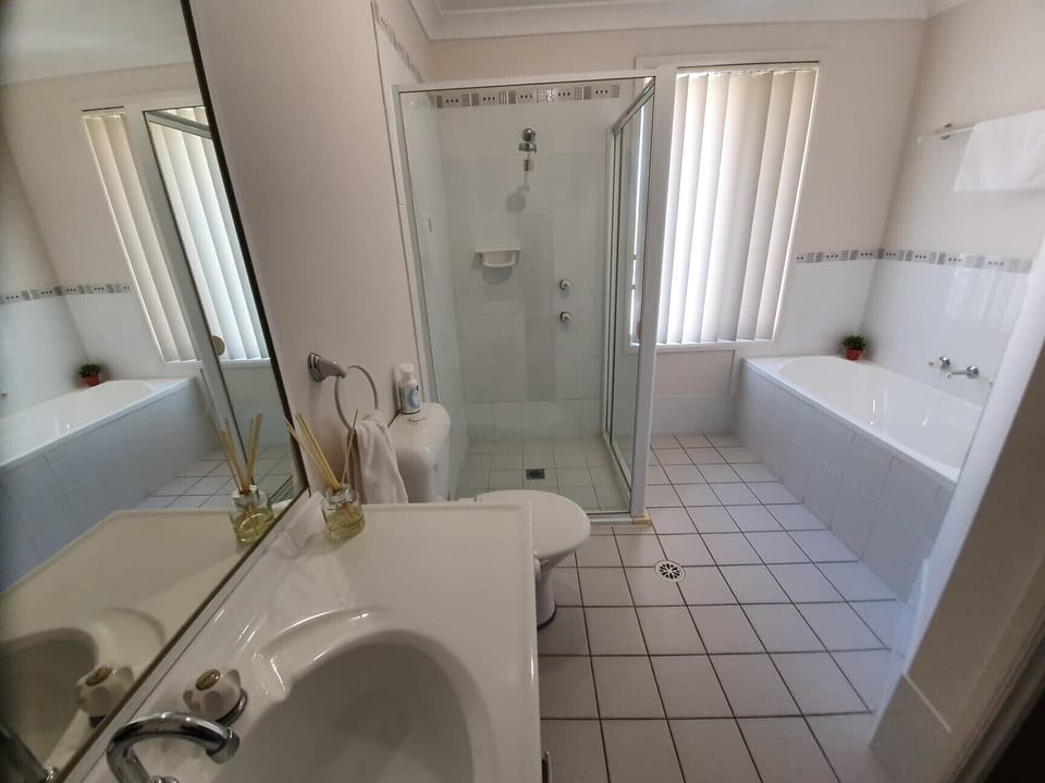 Main Bathroom with shower and bath