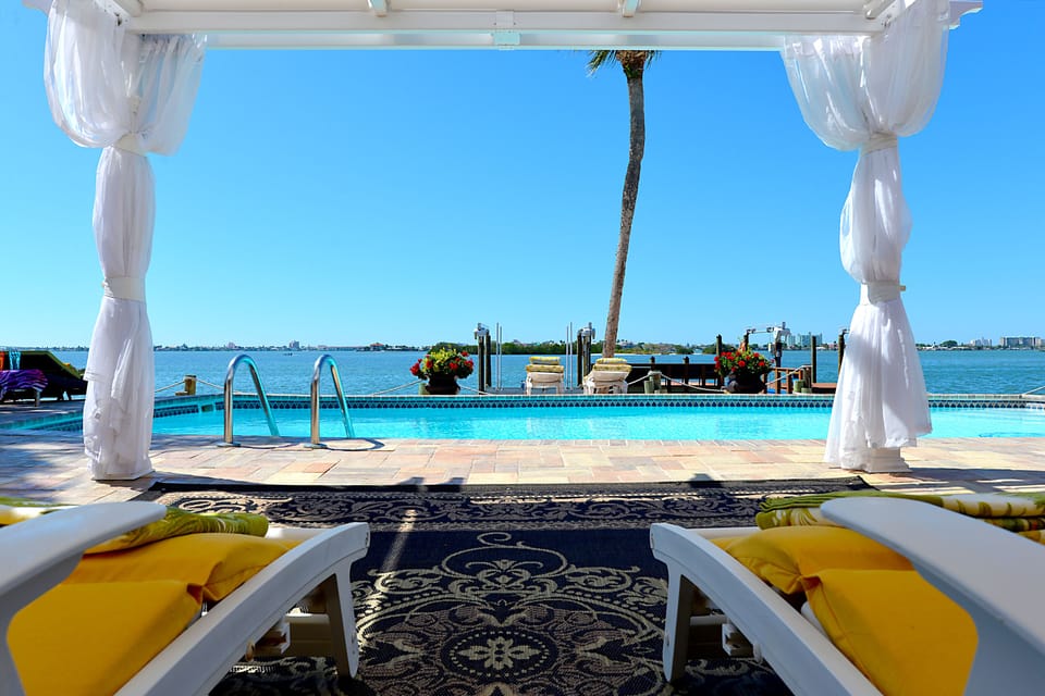 Indulge in the elegant pergola, where breathtaking views await you.