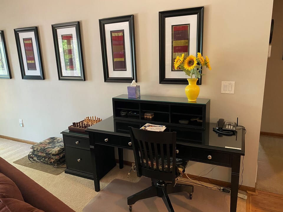 A desk with internet modem for those that must work.